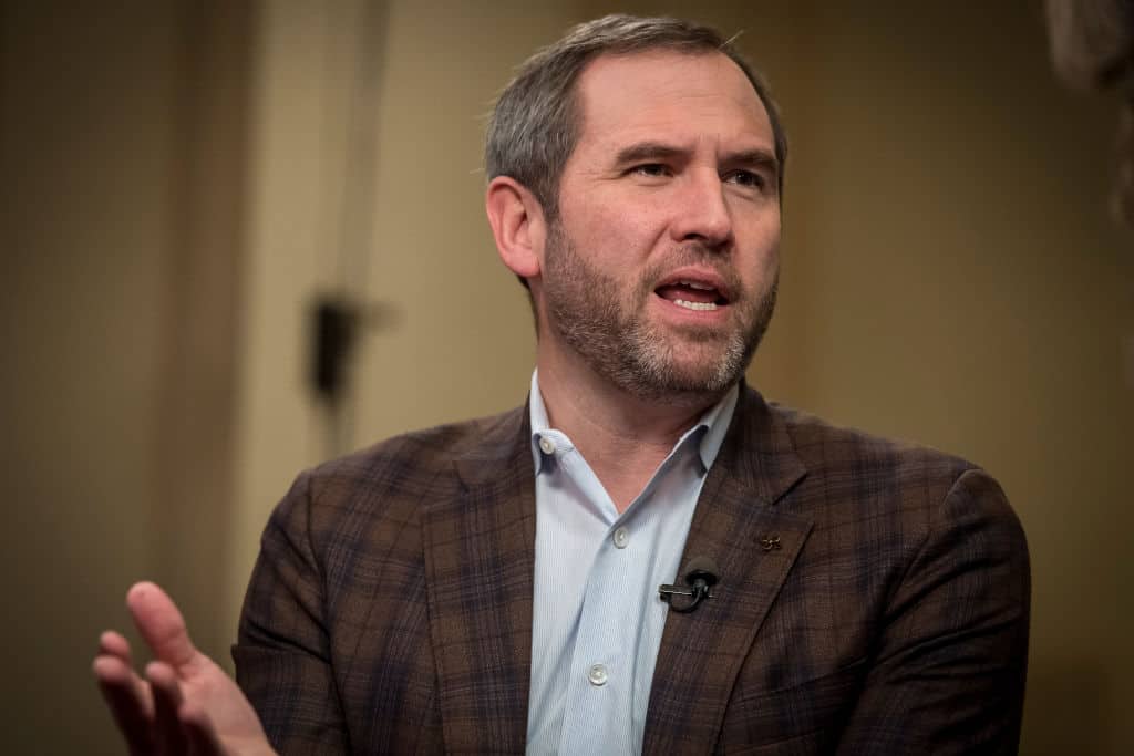 Analyst Disputes Ripple CEO’s Strategy: ‘Two Giants, Same Model’